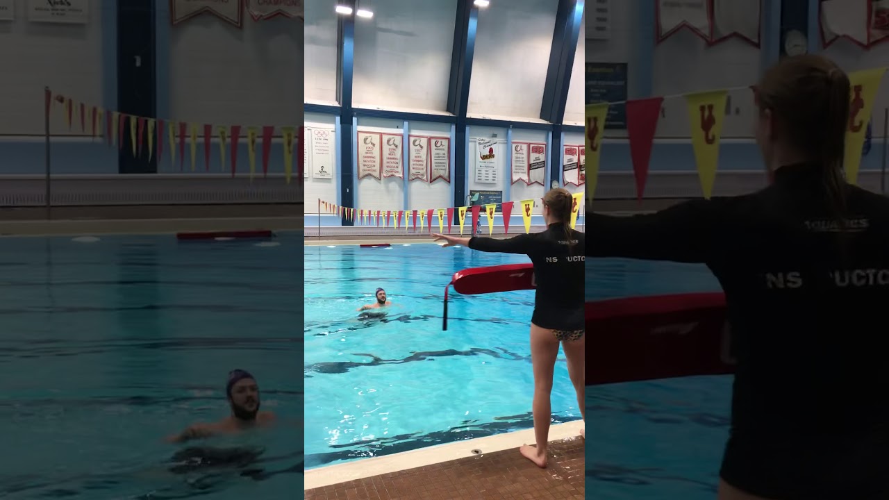 Conscious drowning person rear rescue with tube. Example #1