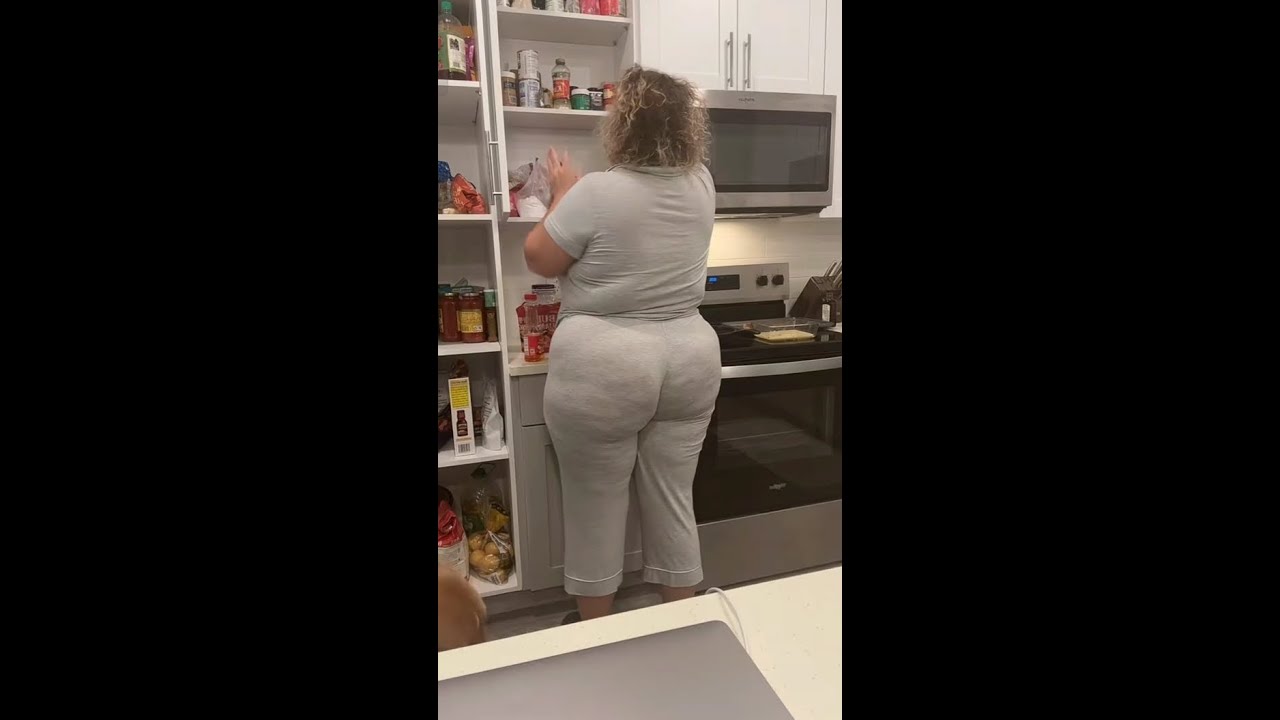 tidy up the shelves in the kitchen before starting to cook