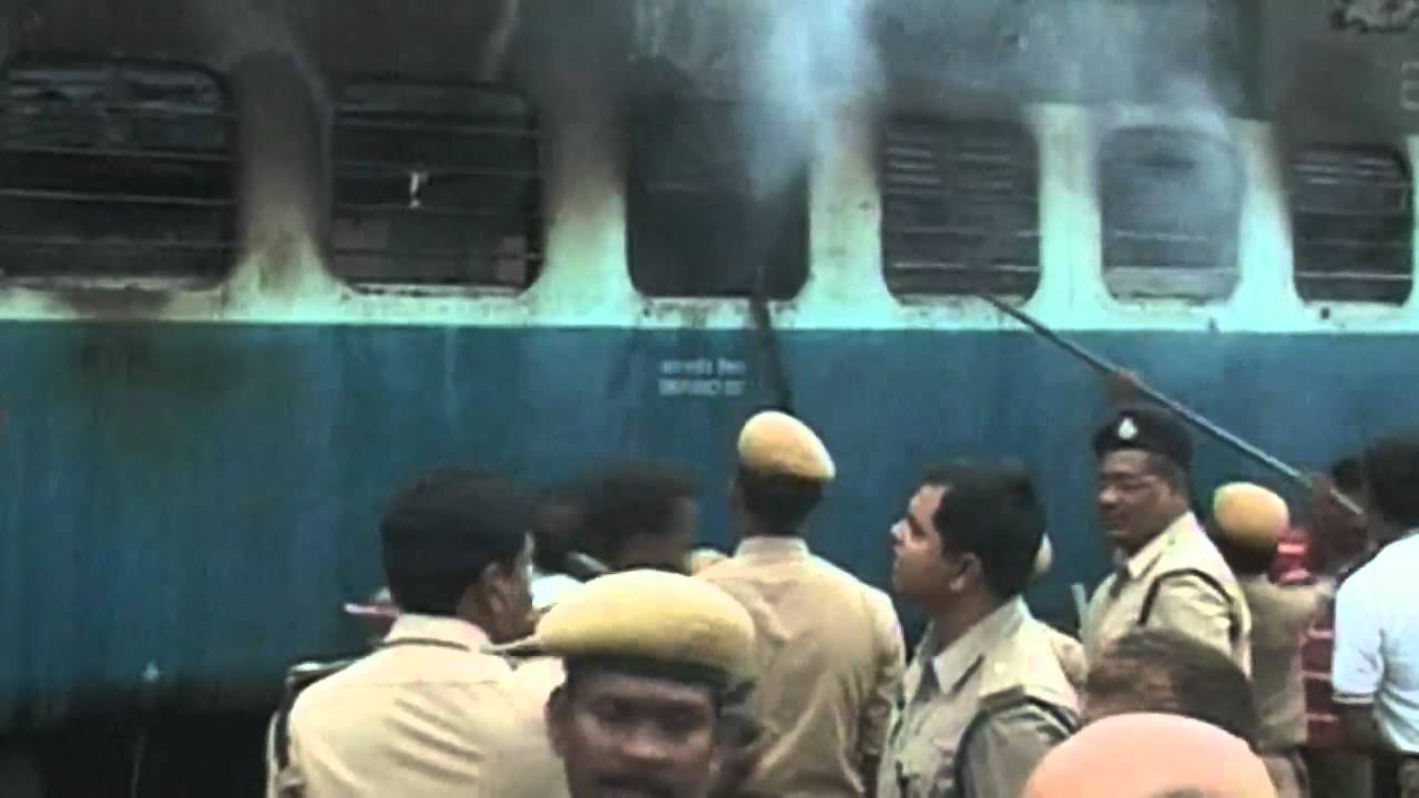 India train wreck: Carriages catch fire