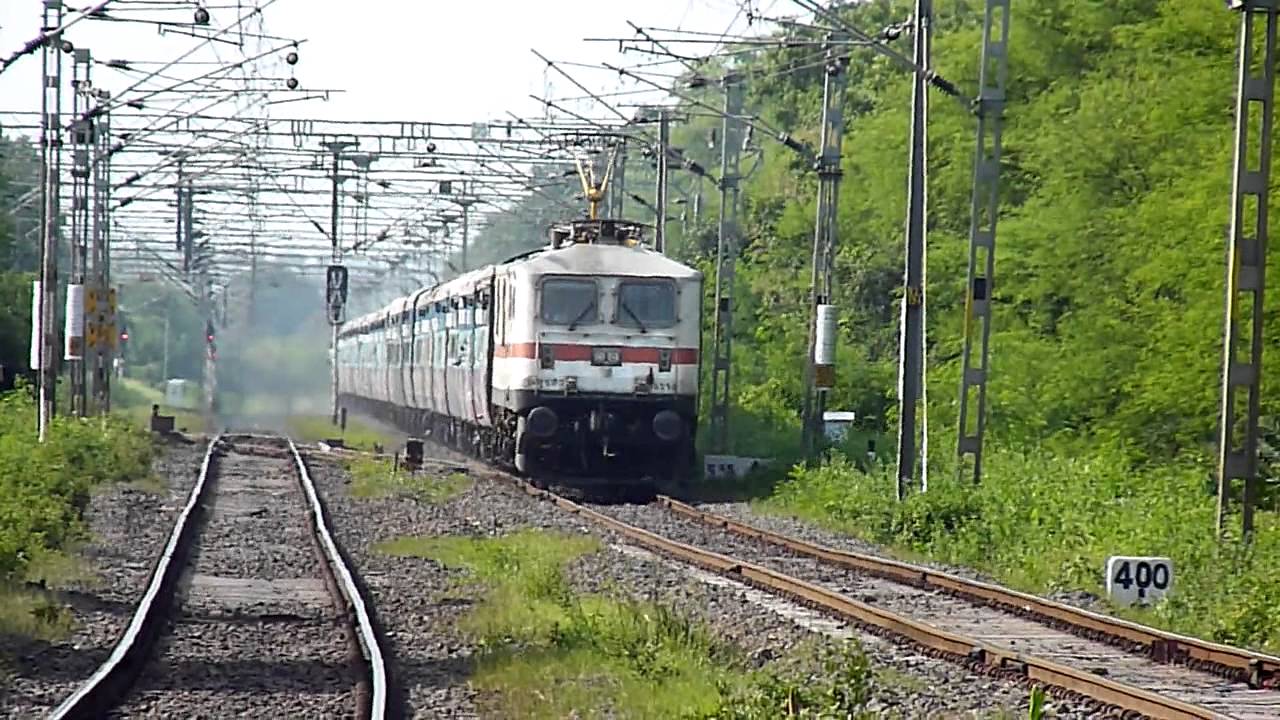 LGD's white elephant WAP-7 # 30290 racing away with 