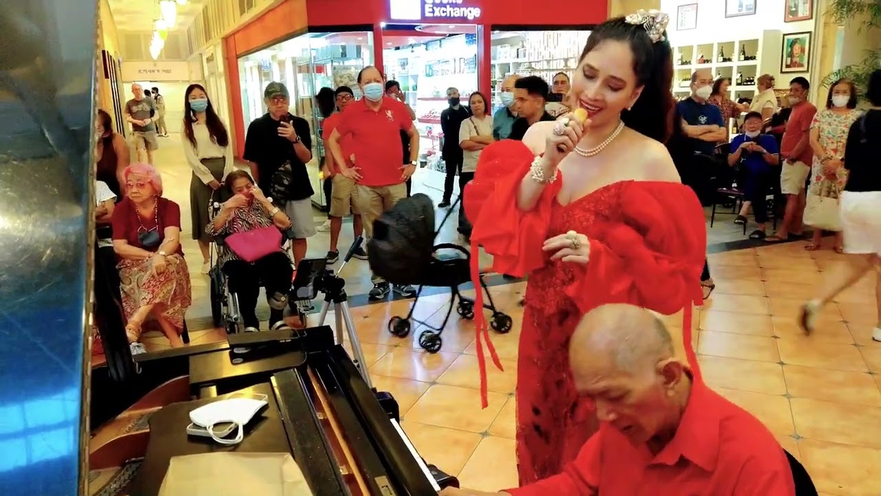 Pretty Soprano Kathy Hipolito Mas sings with Tito Bong Infante at Powerplant Mall