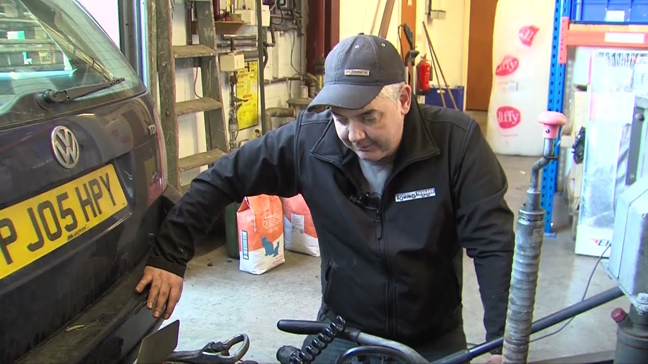 Connecting a braked trailer to the back of a towing vehicle