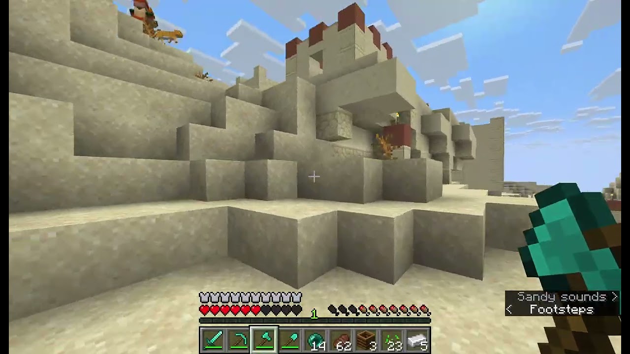 raiding a desert village in minecraft for fun