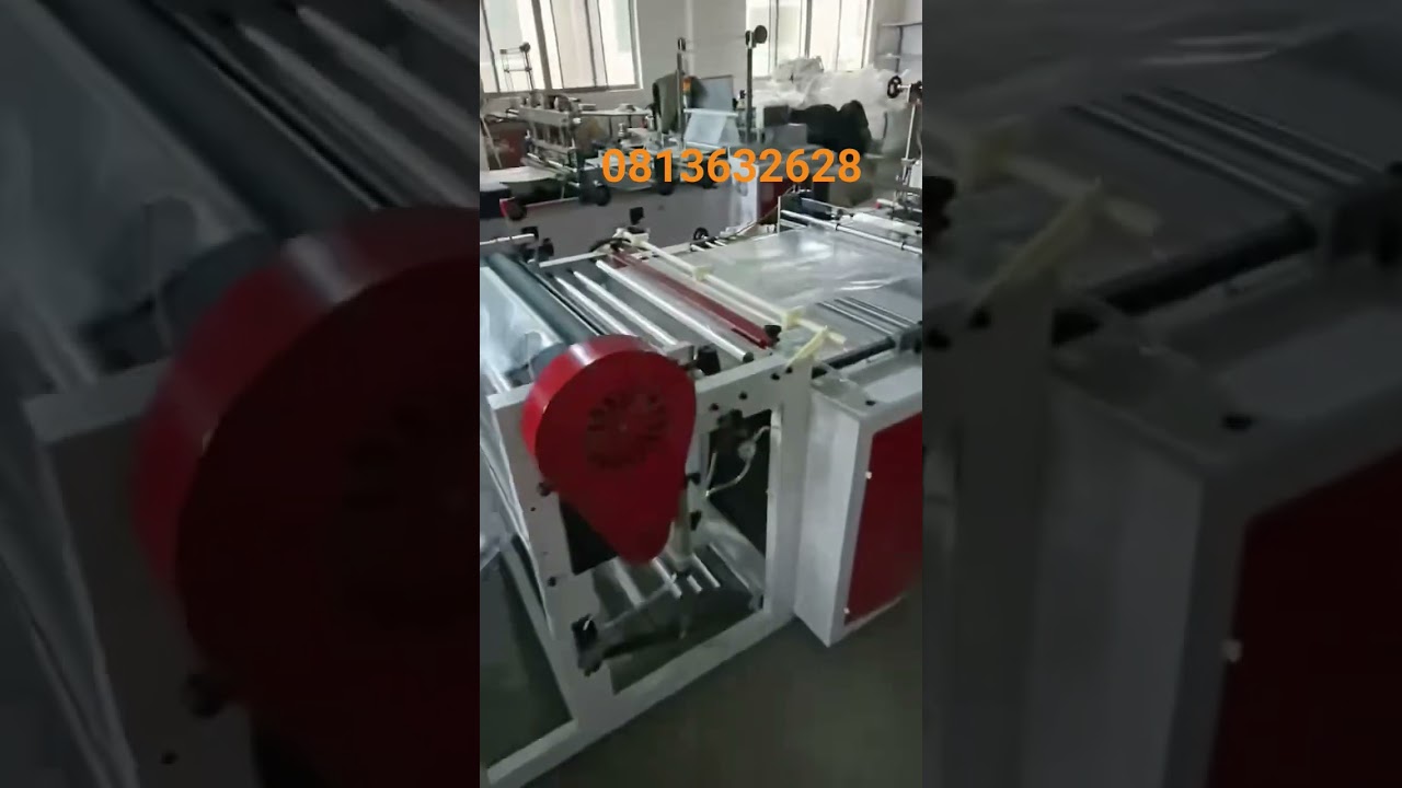 máy cắt túi trùm móc quần áo