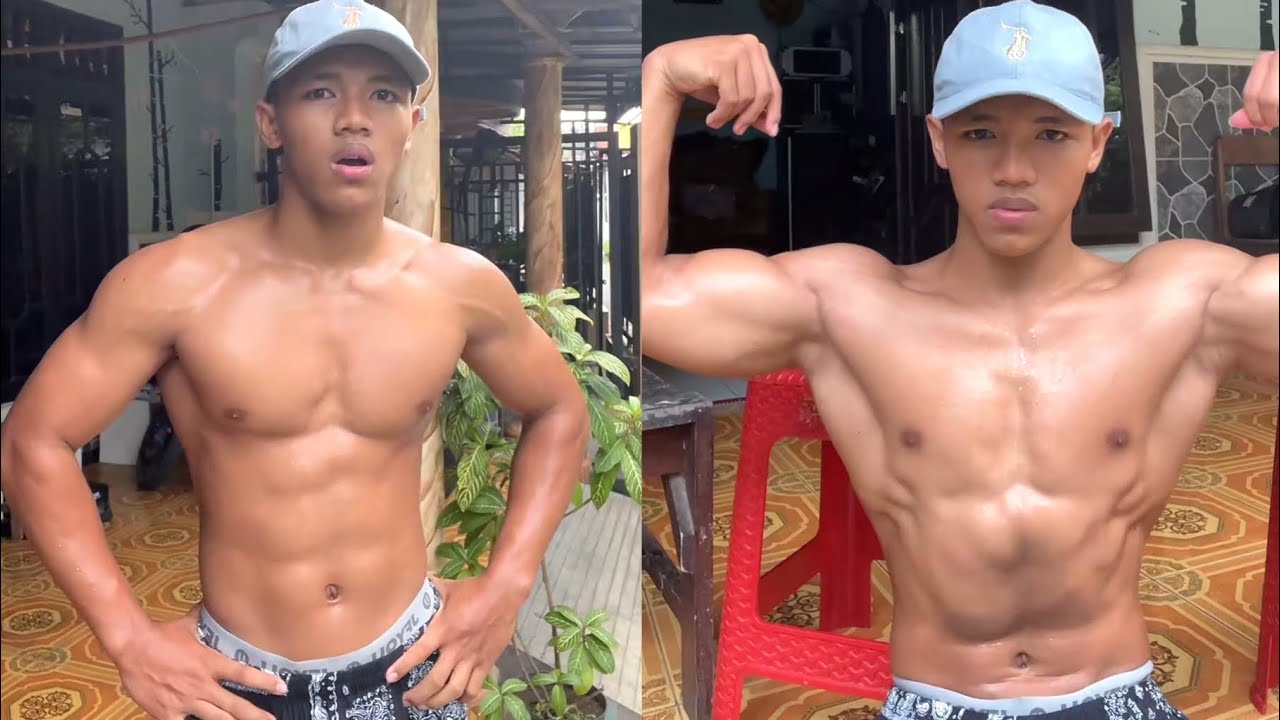 Shirtless young boy with muscle