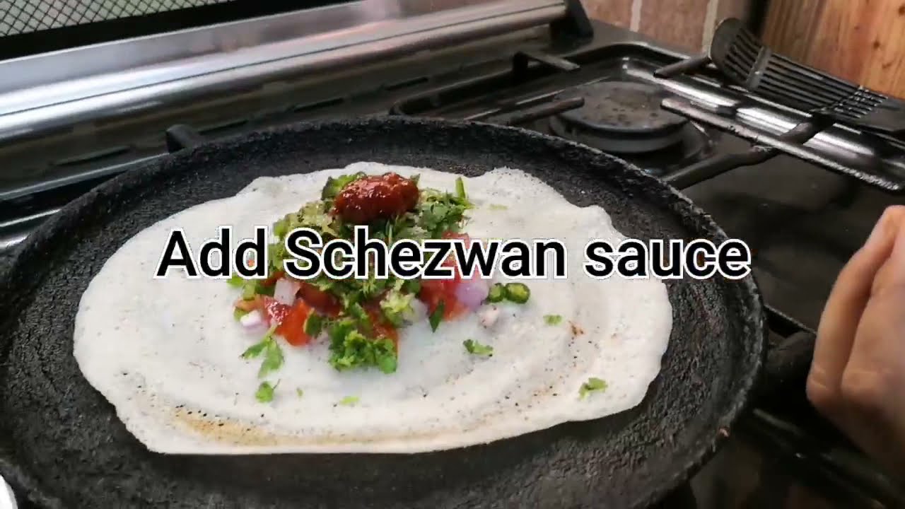 Schezwan cheese dosa recipe in 30 seconds..#schezwandosa #chinesedosa #cheesedosa #shorts