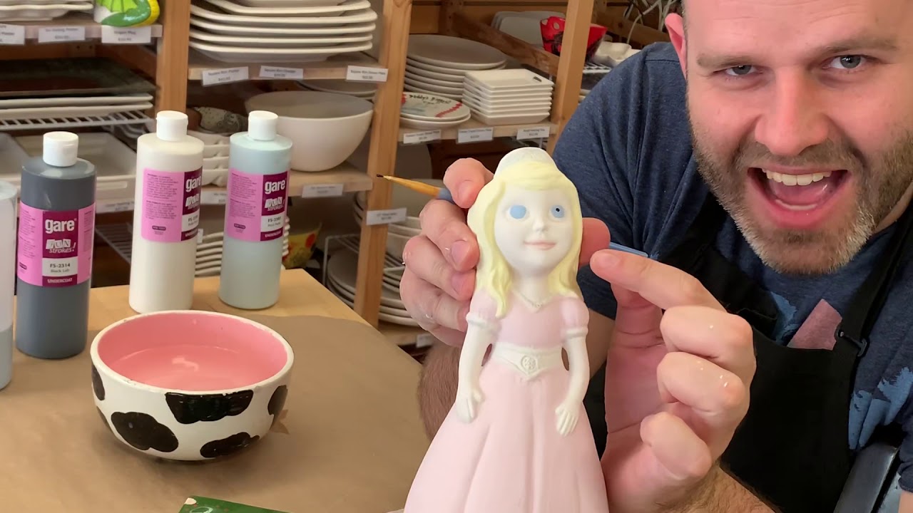 Painting Eyes on Pottery