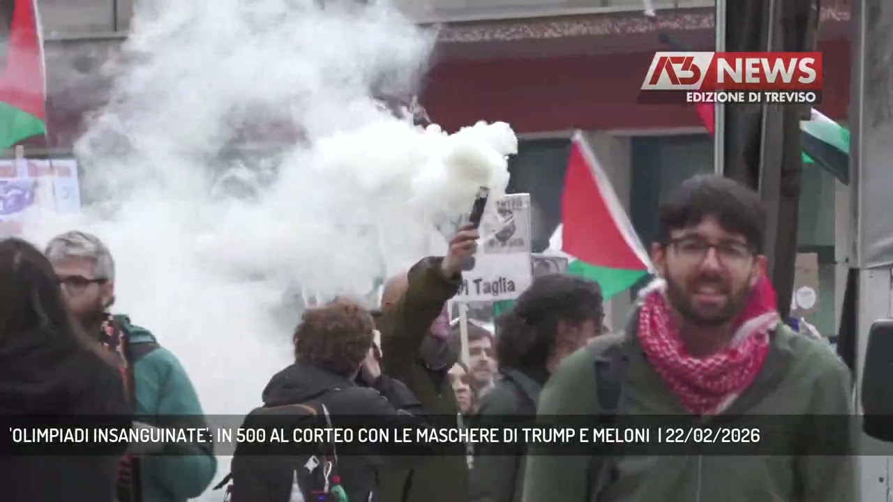 'OLIMPIADI INSANGUINATE': IN 500 AL CORTEO CON LE MASCHERE DI TRUMP E MELONI  | 22/02/2026