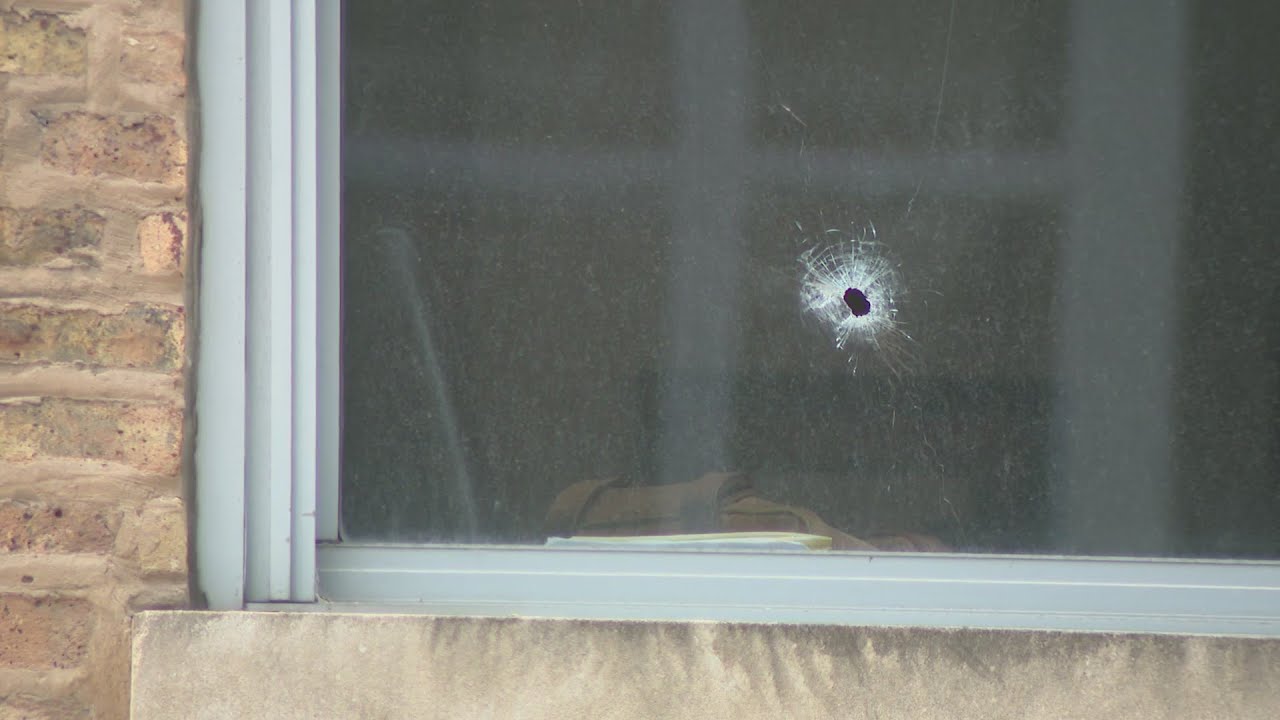 Man shot in head in River North, suspect in custody