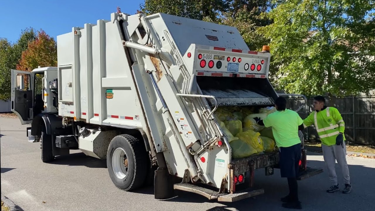 City of Worcester DPW- Mack MRU Mini Pakmor on Yellow Bags