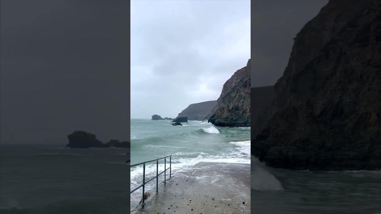 Waves crash over the slipway, St Agnes, Cornwall