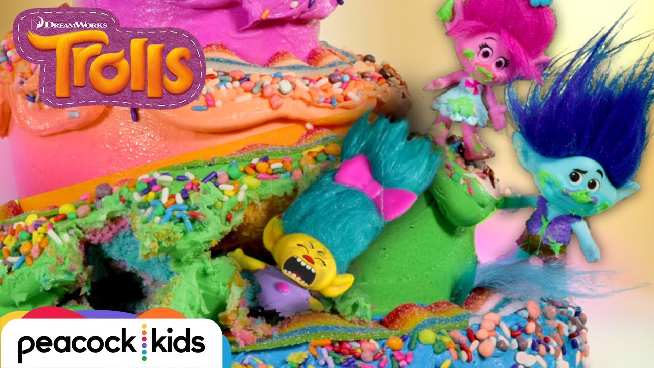 Poppy and Branch Rescue Smidge From Inside a GIANT Rainbow Cake | TROLLS TOYMOTION