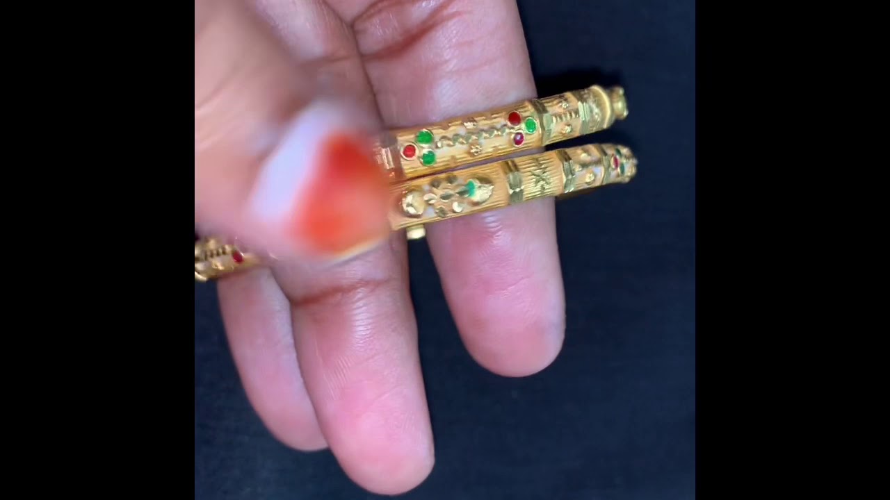 10 grams 24 carat gold bangle Malabar gold green and red color stones