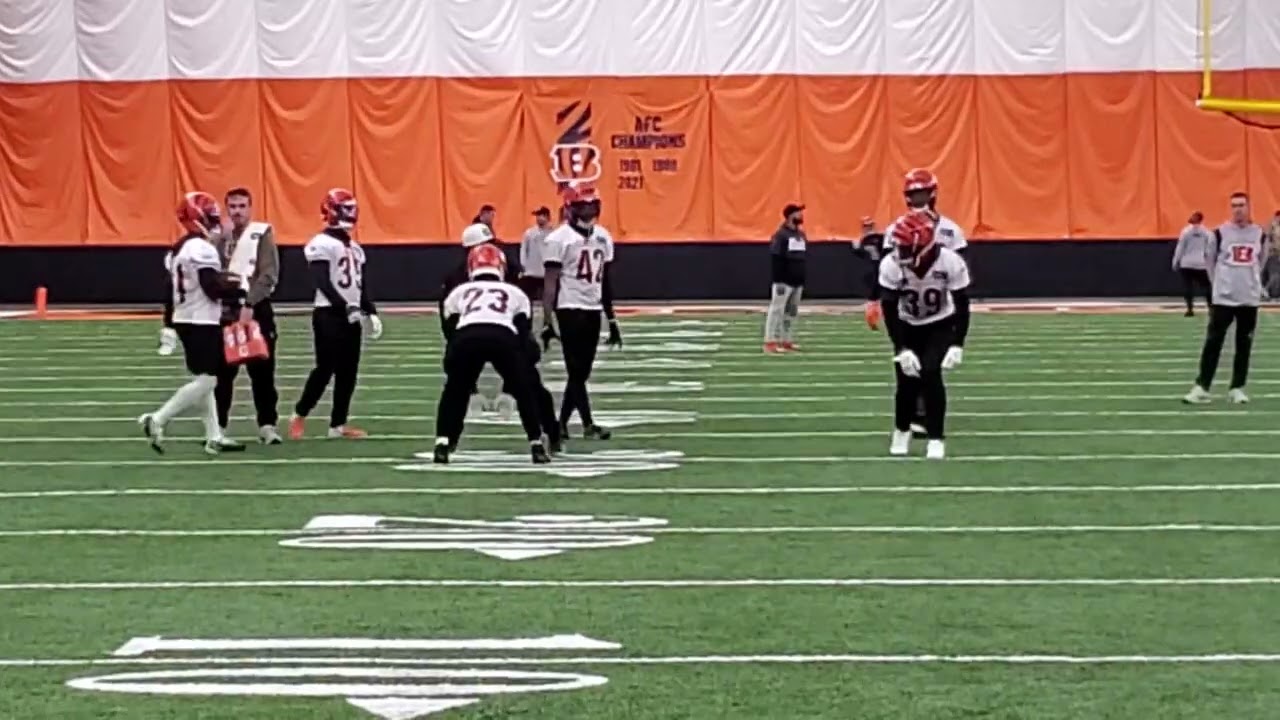 Dax Hill working technique Thursday at Bengals practice