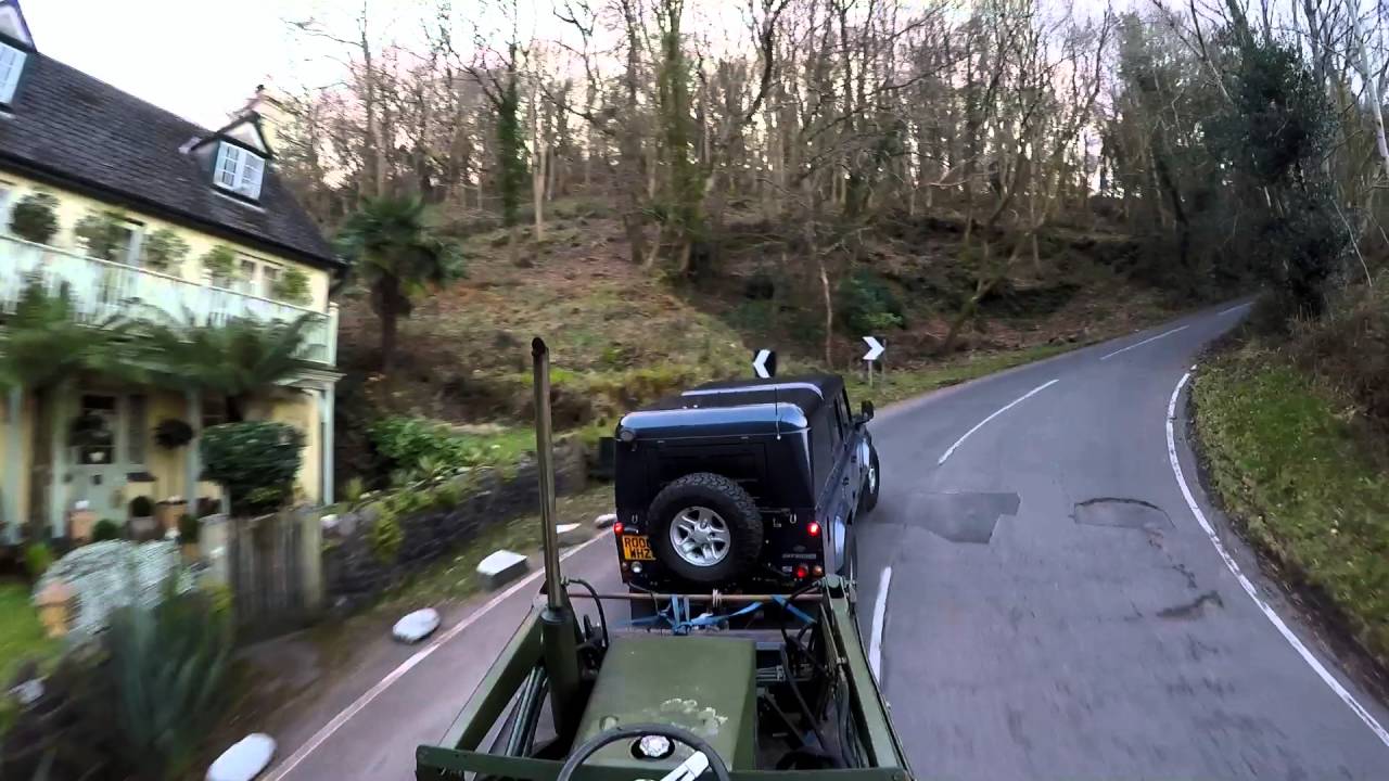 land rover defender 110 Towing Tractor up porlock hill