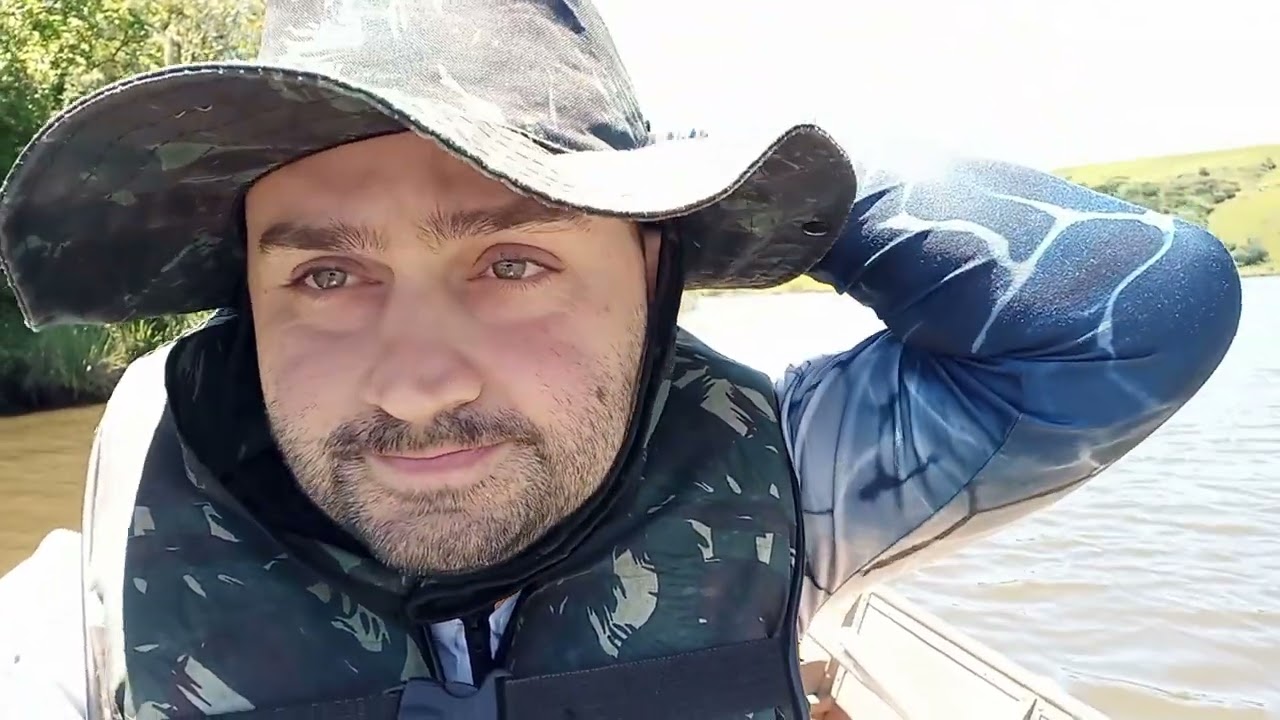 PESCARIA NA BARRAGEM DA DIVISA  POUCO PEIXE ANDEMO MUITO PRA AXAR UM PONTO COM PEIXE