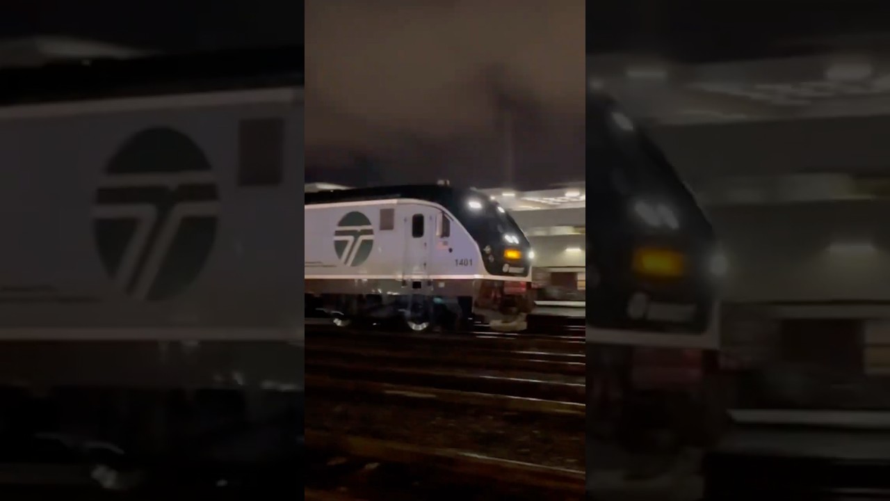 Amtrak 506 passing CP Stadium in Downtown Seattle. 