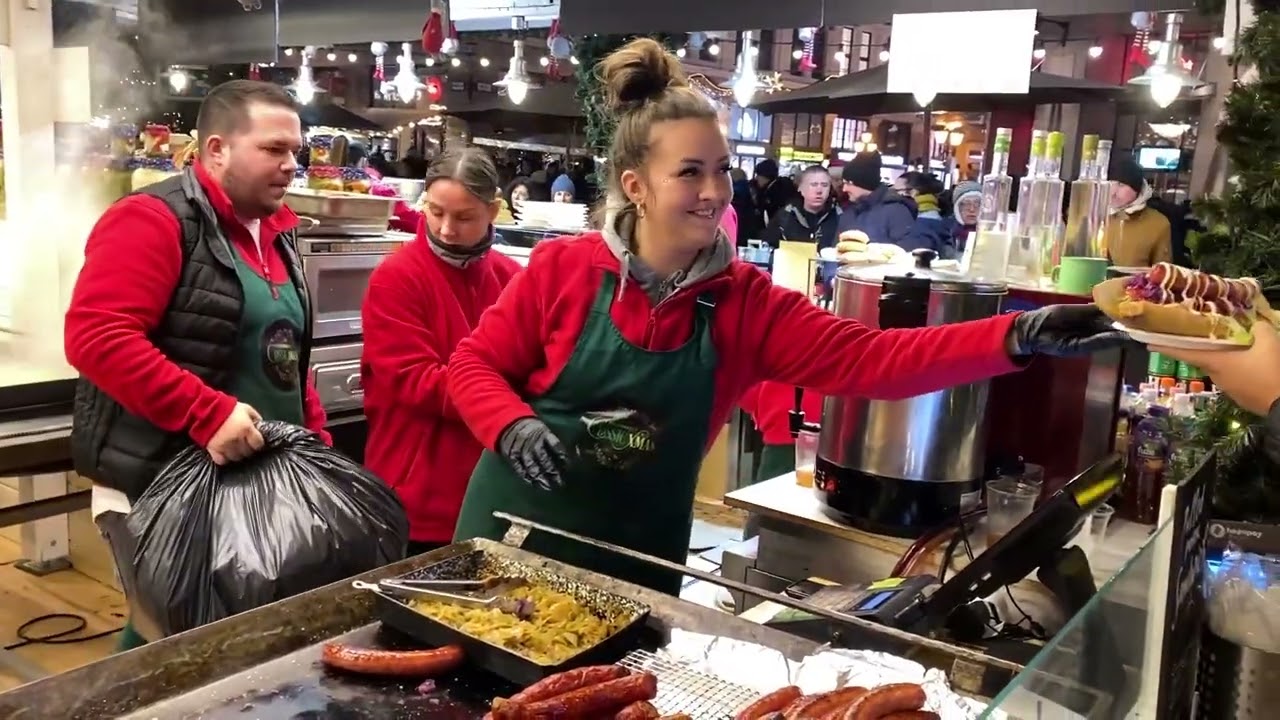 Street food in Budapest. Best sausages in Budapest. Cooking hot dogs with Hungarian sausages