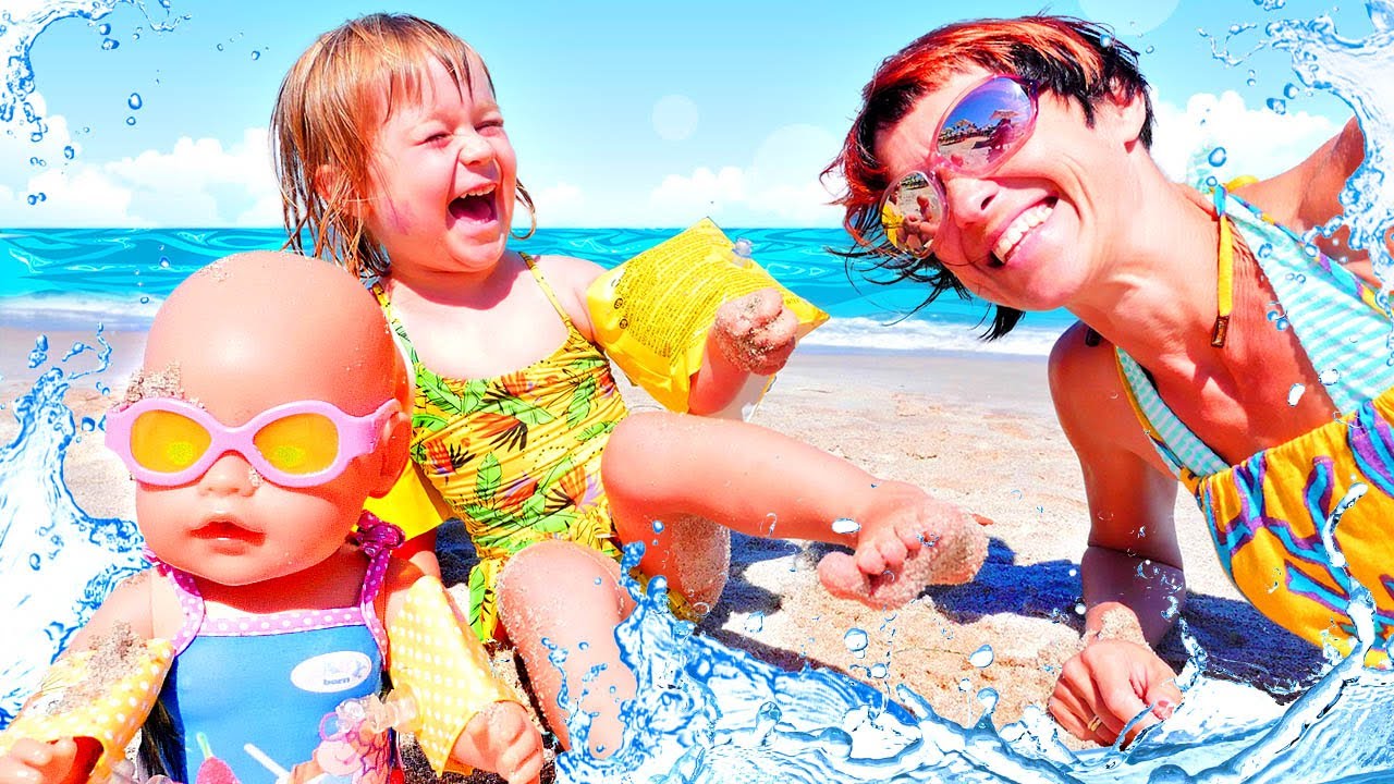 Baby Born doll & baby Bianca swim in the sea - Videos for kids & sand games with baby dolls & toys