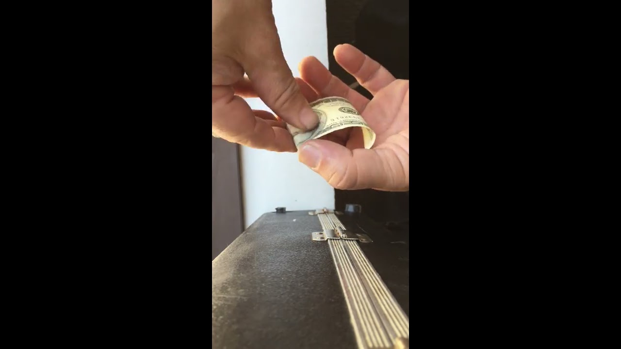 How to roll a $100 bill