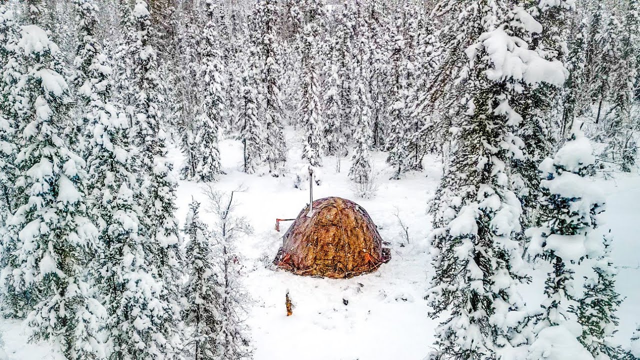 SNOW FREEZES TENT. WOMAN SHOWS UP