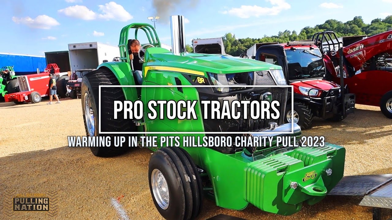 Pro Stock Tractors warming up in the pits for the Hillsboro Charity Tractor Pull 2023