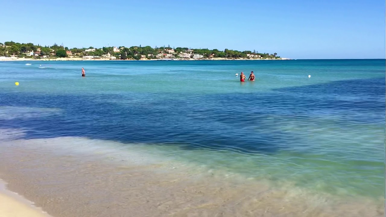 Fontane Bianche beach in Sicily Italy on a yoga retreat.