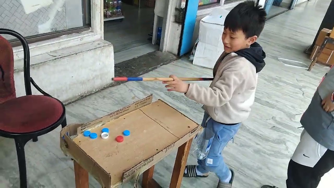 Snooker completion between two brothers enjoying playing 