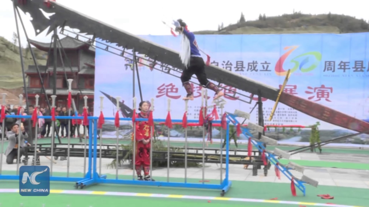Eye-opening stunts by ethnic Miao people as SW China county celebrates founding