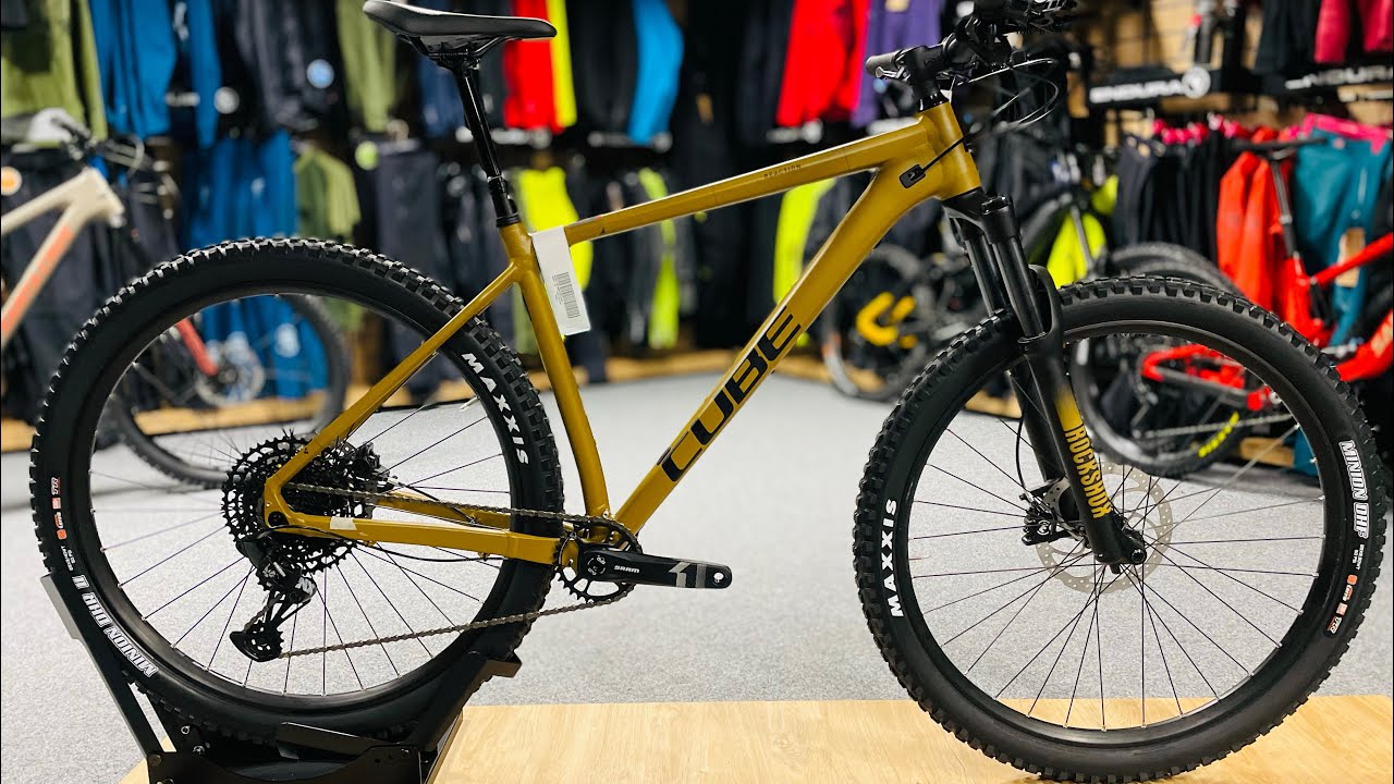 Rower Cube Reaction TM caramel'n'black - łączy wydajność z niezawodnością na każdym szlaku! 🚴‍♂️💥