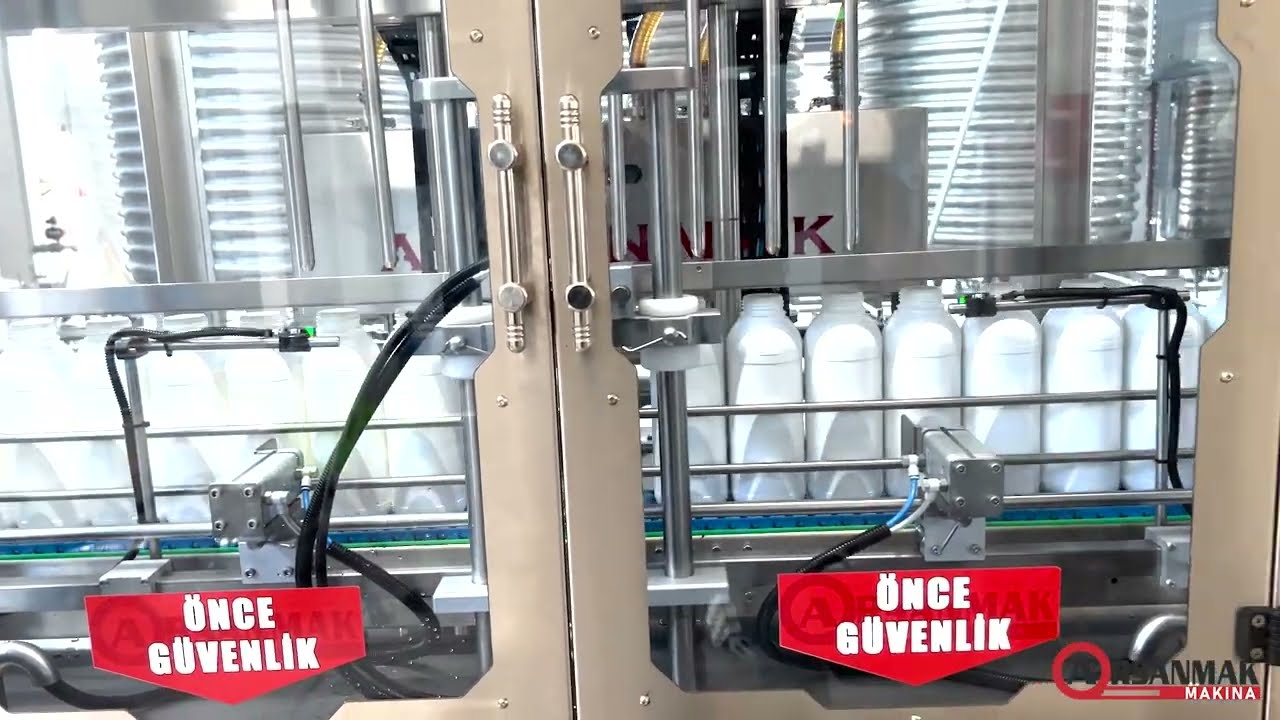 Flowmetreli Dolum Makinesi, Pick & Place Kapatma Makinesi ve Yuvarlak Şişe Etiketleme Makinesi