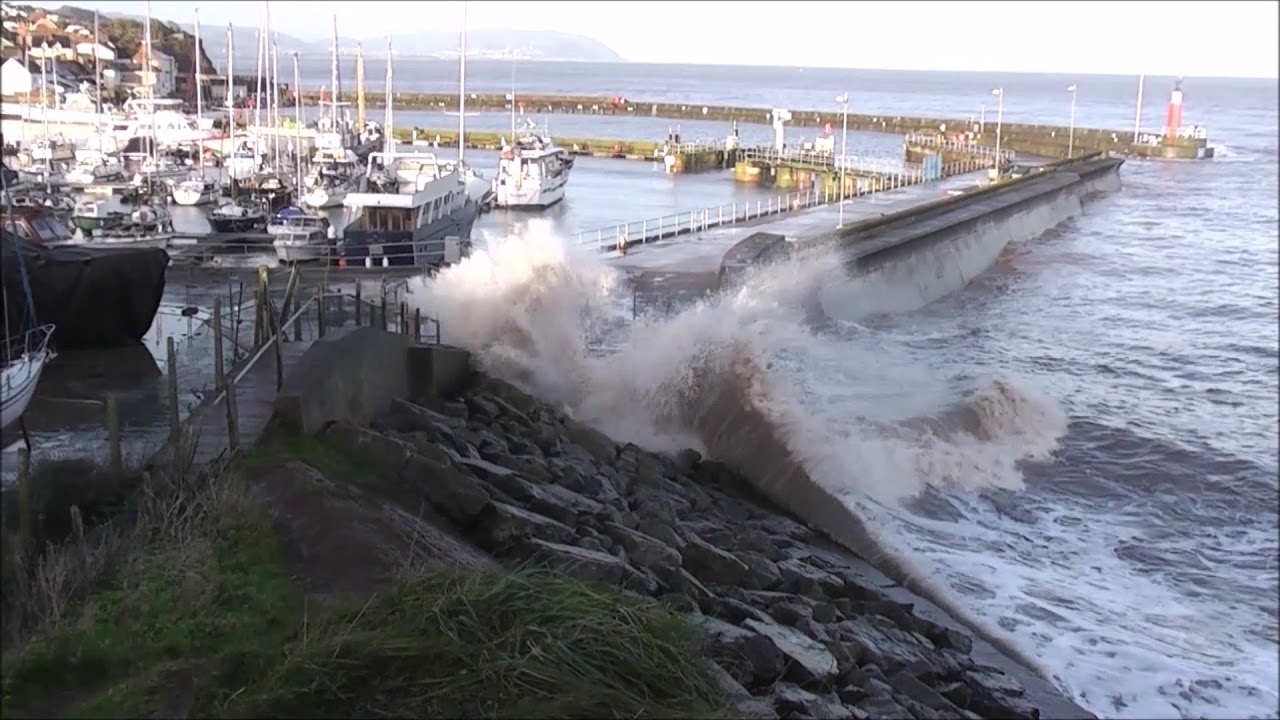 A STORMY SEA AT WATCHETS NOW BREACHED EAST QUAY SEA WALL