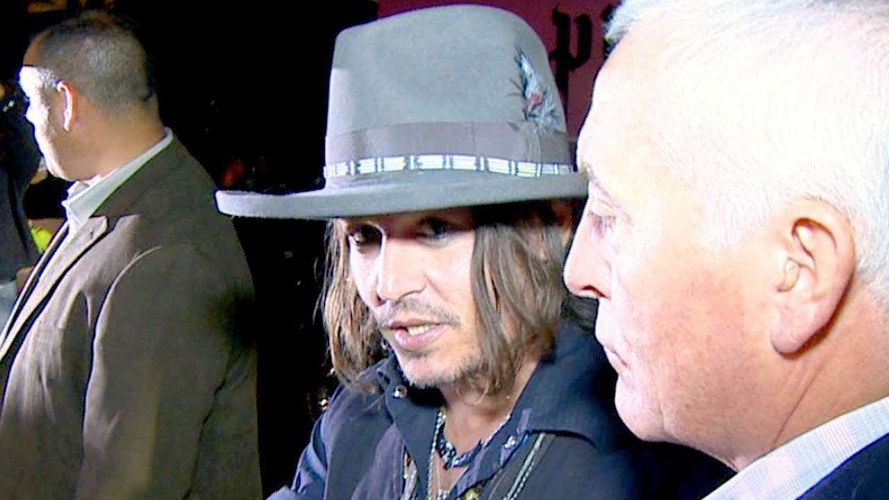 Johnny Depp Makes Rare Public Appearance for Aeros
