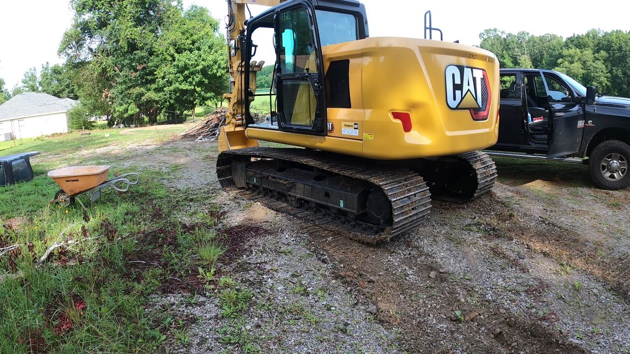 I'm Back!!  Cat 313 getting put through the paces