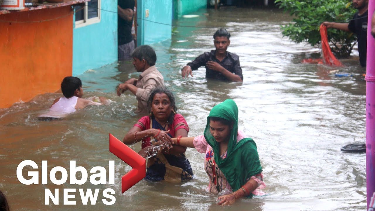 Thousands evacuated in India as torrential rains flood cities