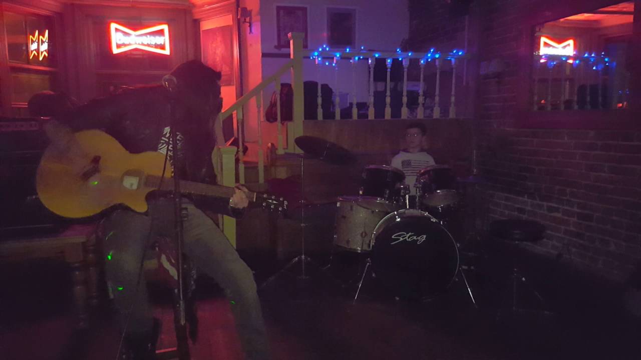 8 year old nathan at his first jam night drumming with angelo Tristan