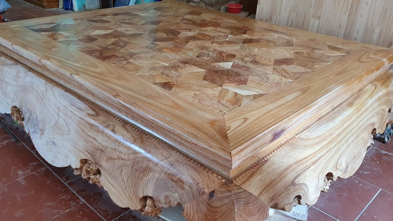 Great  skills of the young carpenter, joining pieces of wood to form a beautiful wooden picture