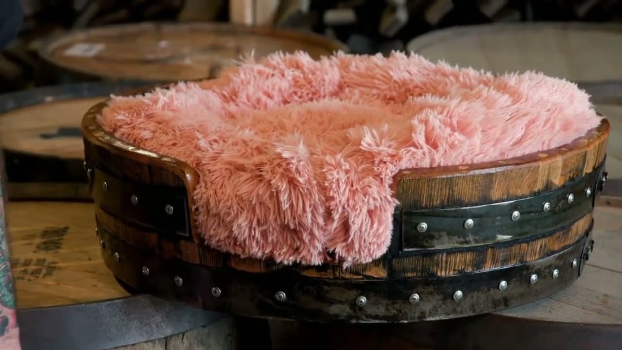 Whiskey Barells restored and made into a dog bed for Chum's dog
