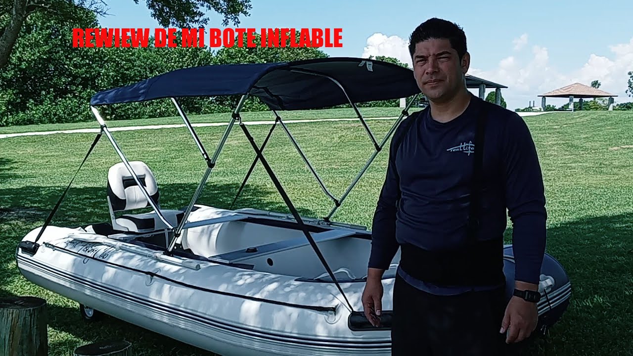 Bote inflable con piso rígido y remos