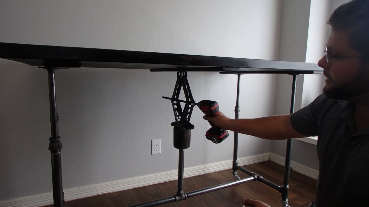 The Erector - Adjustible Table/Desk