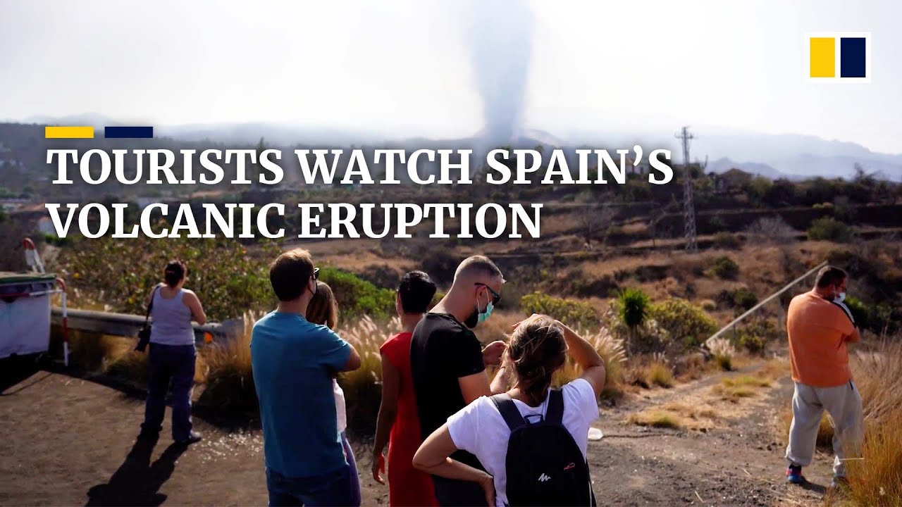 Tourists gather on Spain’s La Palma island for volcanic eruption