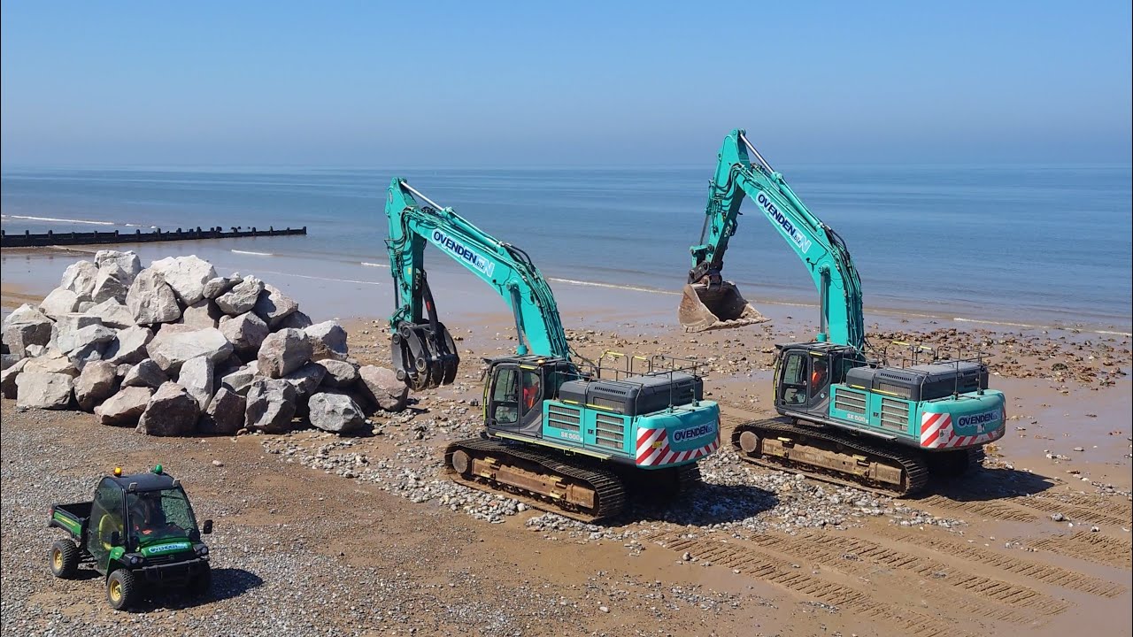 125. Cromer Beach Sea Defences Reinforced with Big Rocks - or is it a Excavator Pre-Mating Ritual ?