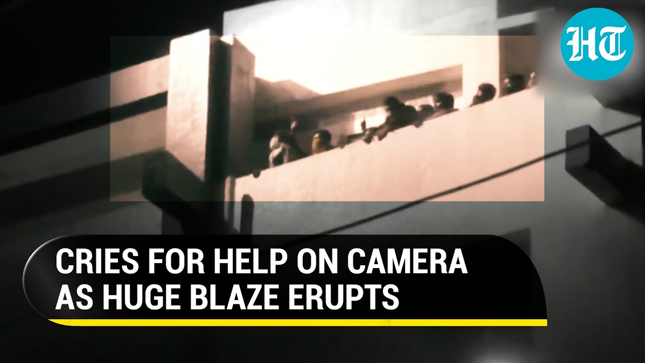 Factory fire: Workers stand on roof, call for help in harrowing video | Surat
