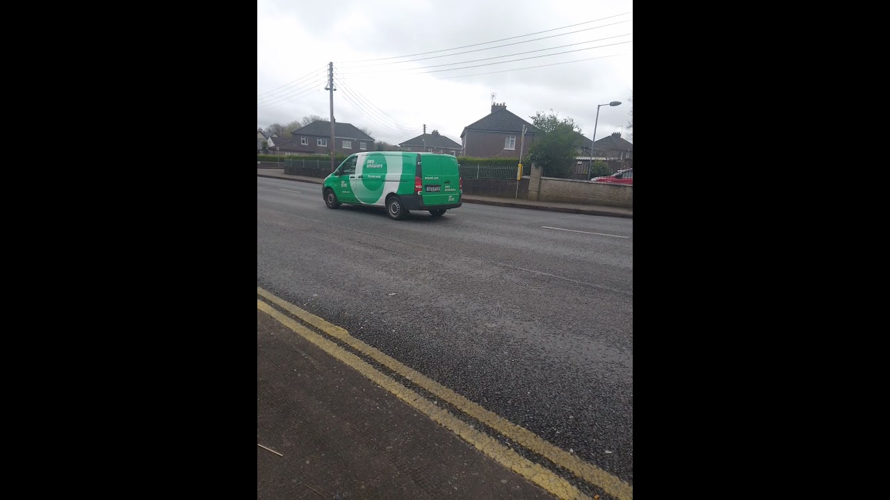 An Post delivery van driving on Togher Road