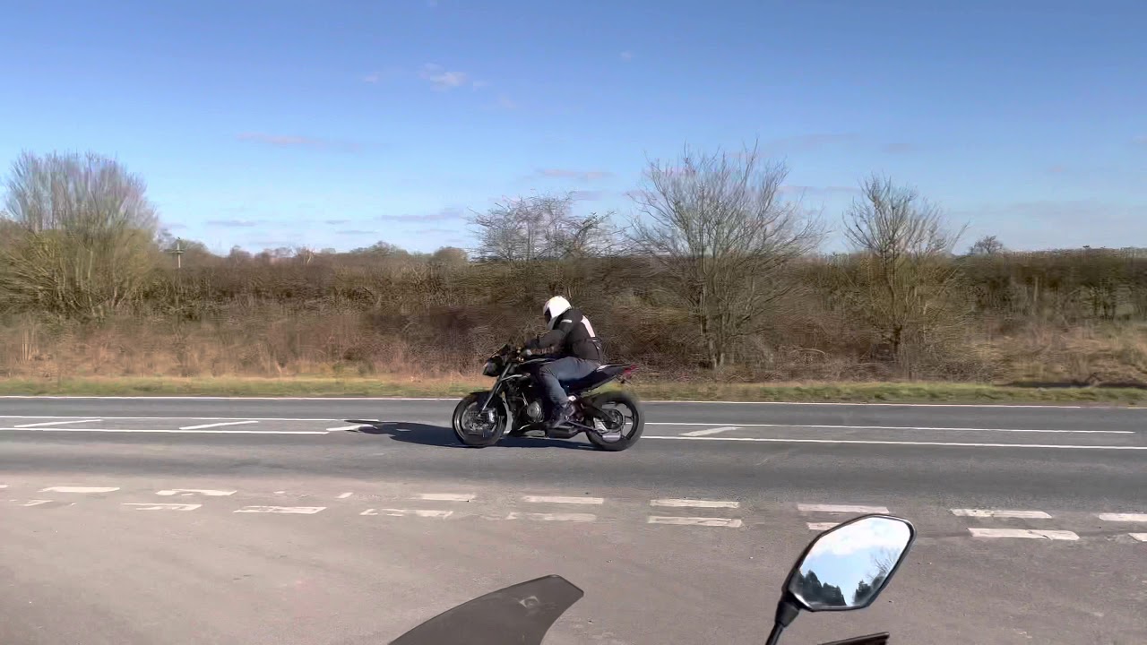2020 Triumph Street Triple RS 765 Exhaust sound fly by, Downshifting and the rev limiter.