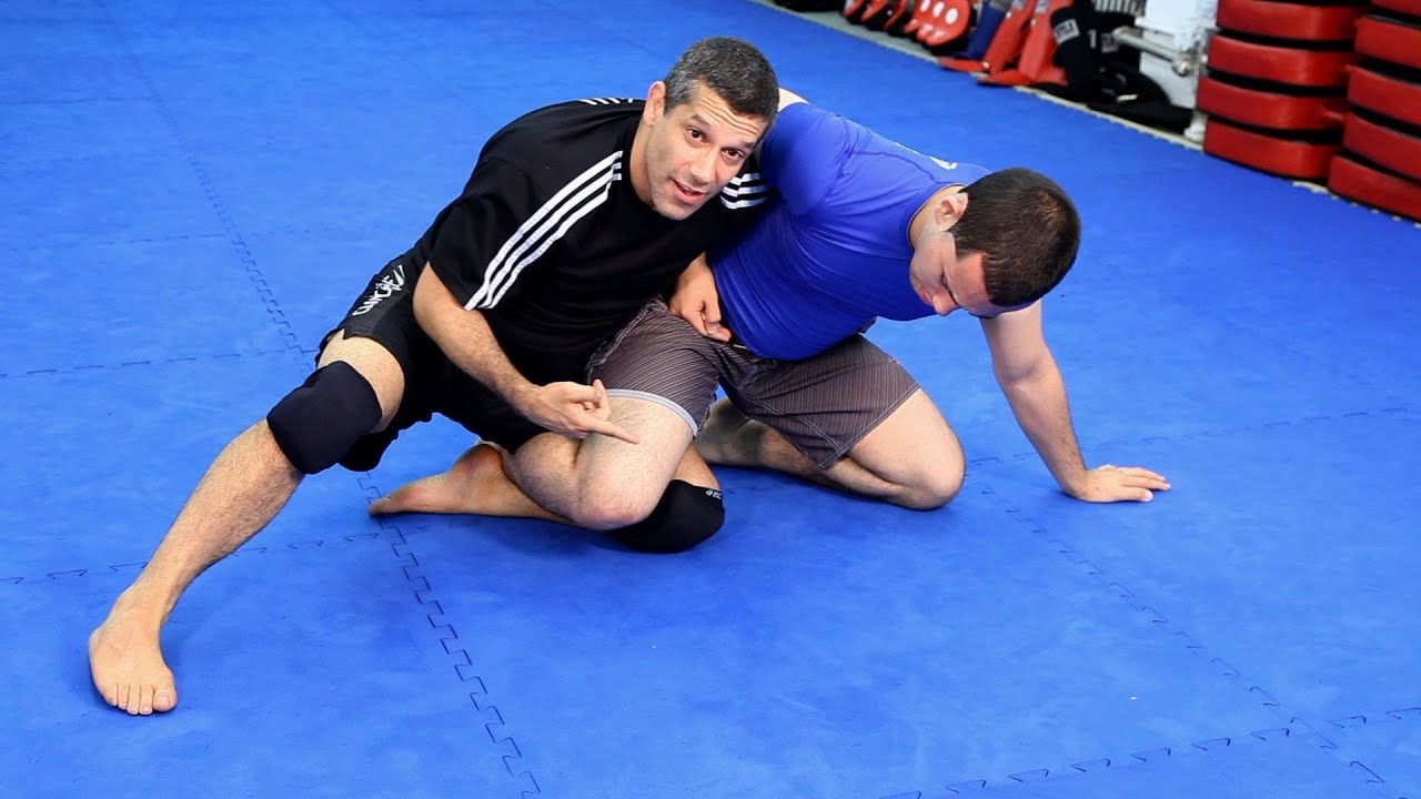 How to Do Half Guard Sweeps | MMA Fighting