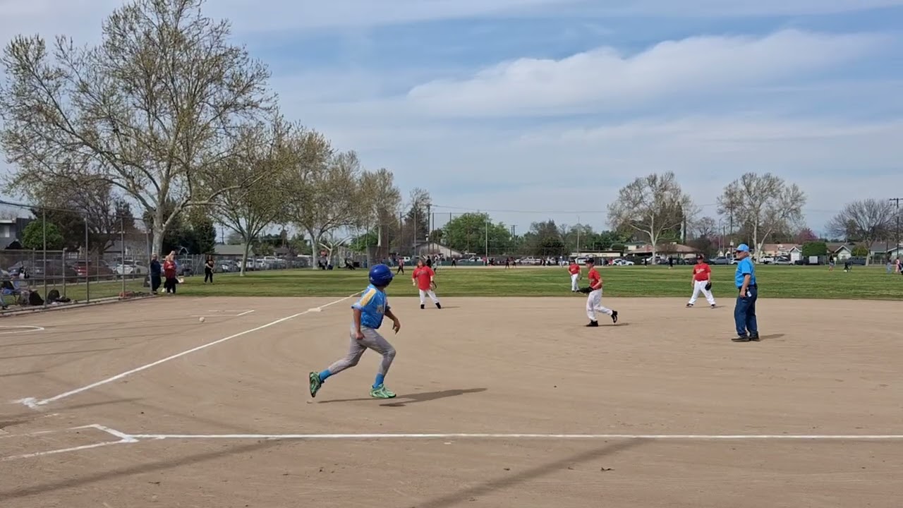 Evan pitching his first game 