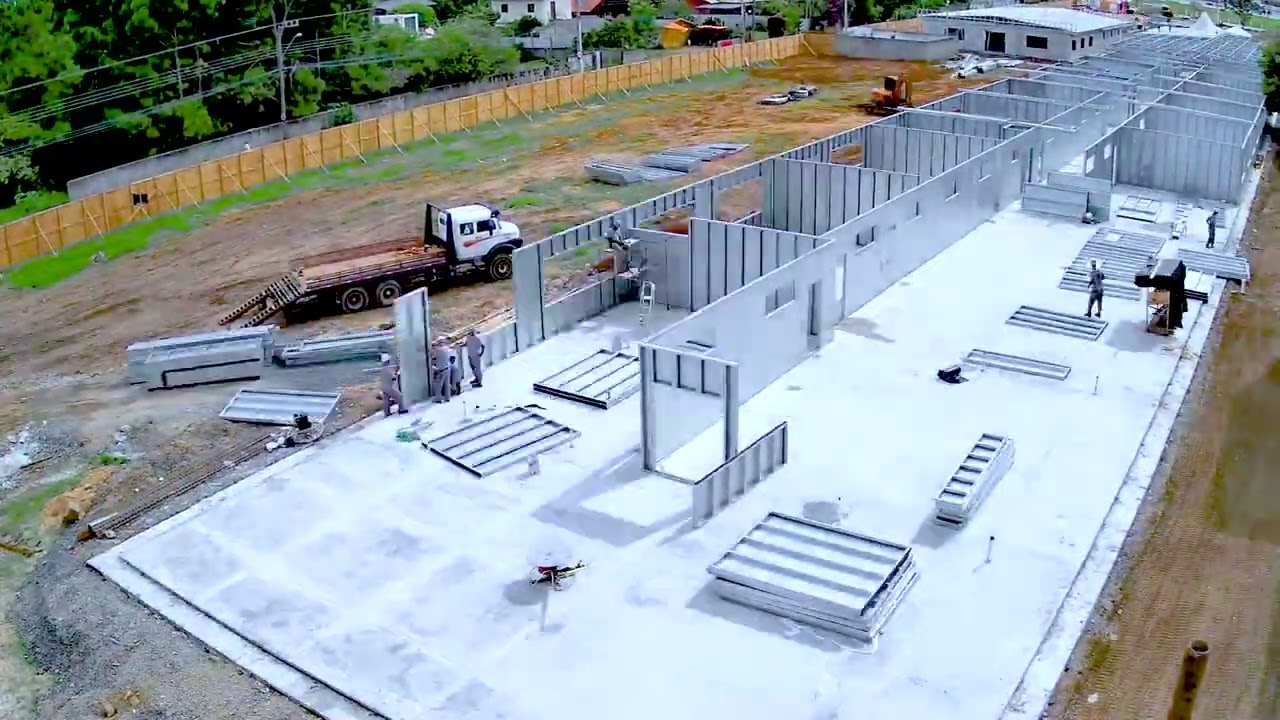 A LEVEL 5 HURRICANE RESISTANT,  STRUCTURAL STEEL PANEL PARTITION WALLS SYSTEM, BY QUICK HOUSE USA.