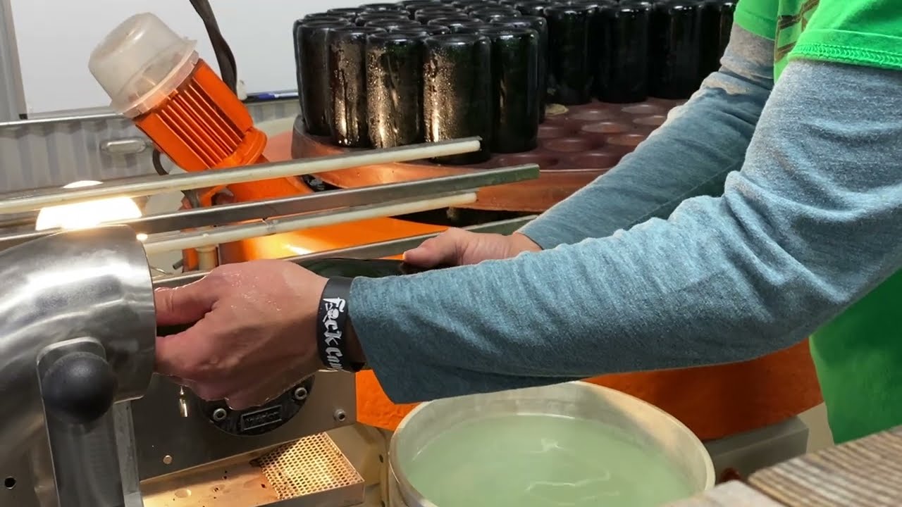 How to disgorge frozen yeast plugs from bottles at a meadery