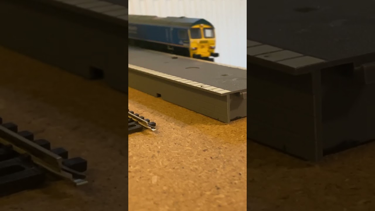 66623 passes station on light loco